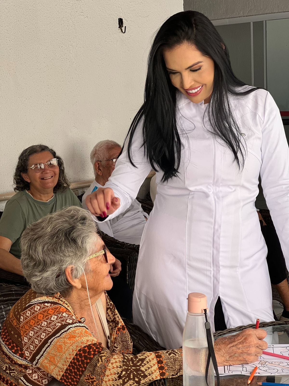 Elenita Guimarães em atendimento